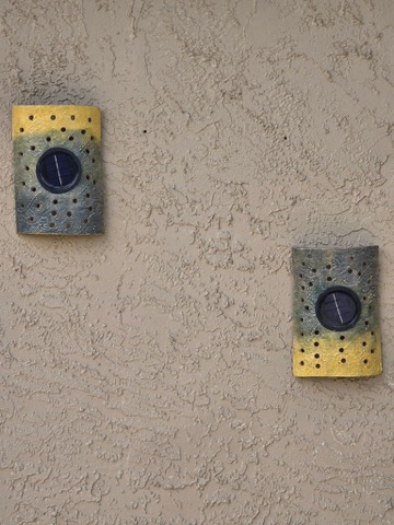Handmade outdoor solar wall sconce pair by Clay Therapy